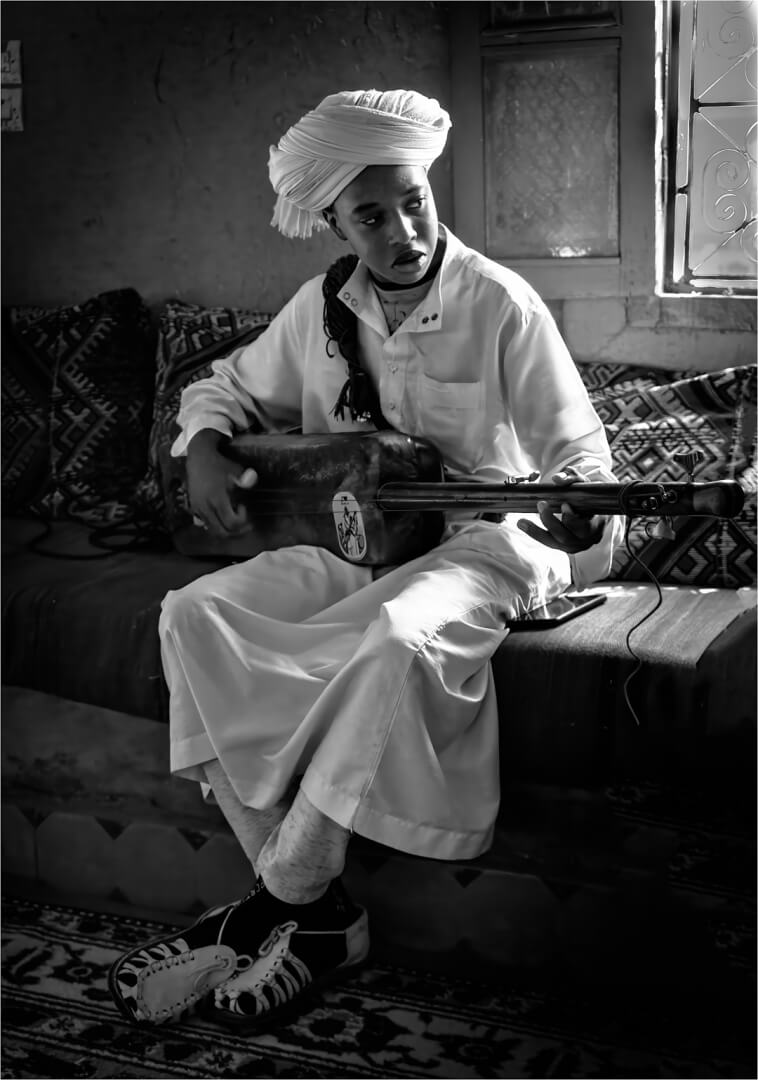 2025 Annual Champion For Print Playing The Guembri By Paul MacKay